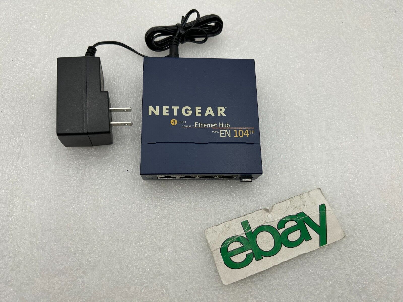 Netgear EN104TP Blue 4-Port 10 Mbps RJ-45 Ethernet Hub with AC Power Adapter