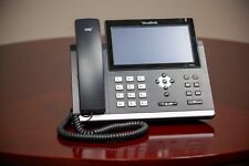 Assortment of Yealink IP phones and accessories  picture