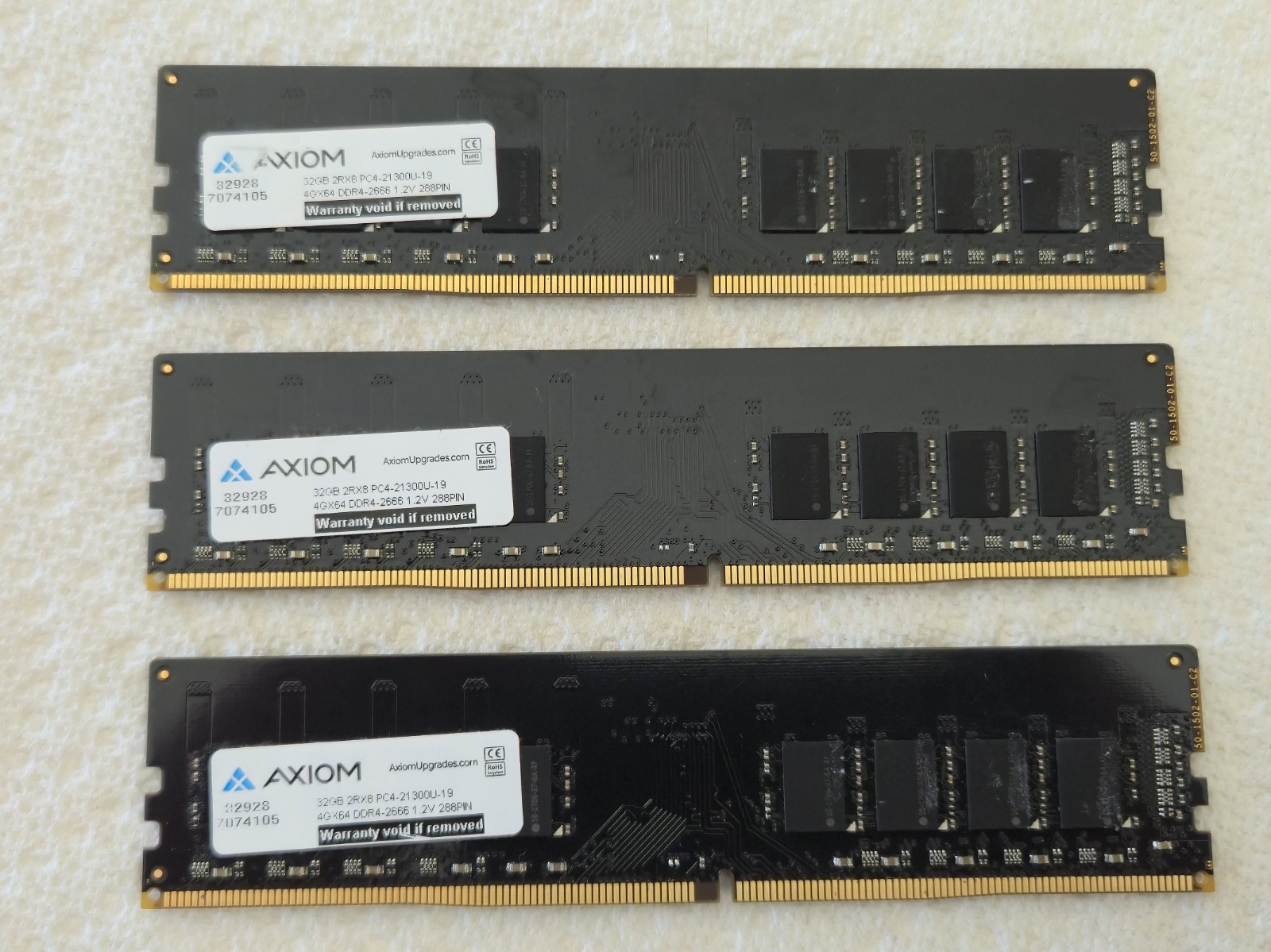 Lot of 3 AXIOM 32GB DDR4-2666 UDIMMS. Tested Good. May have minor scratches. Lot of 3 AXIOM 32GB DDR4-2666 UDIMMS. Tested Good. May have minor scratches.