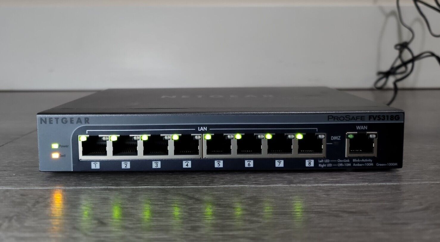 Netgear FVS318G ProSafe 8-Port Gigabit VPN Firewall with Power Cord. WORKS WELL